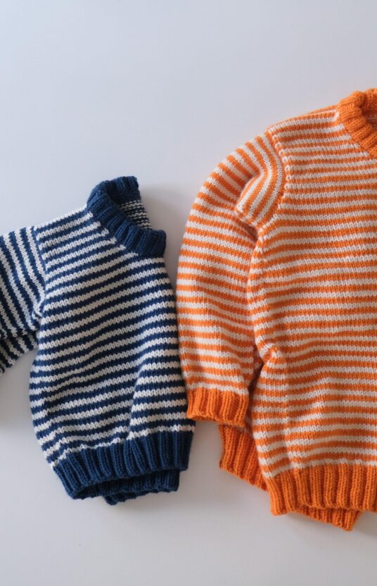 knitted sweater child with stripes pattern