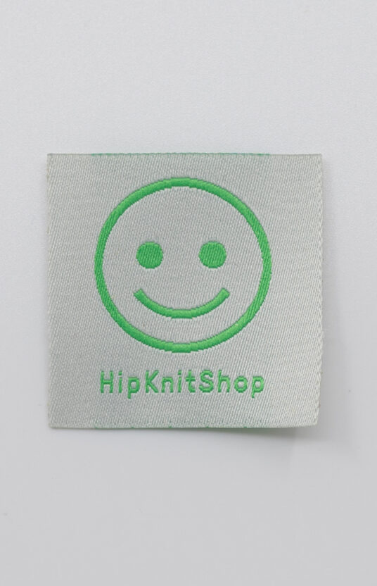 label knit smiley