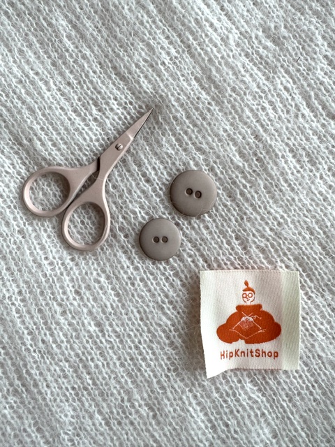 Beige matte plastic button
