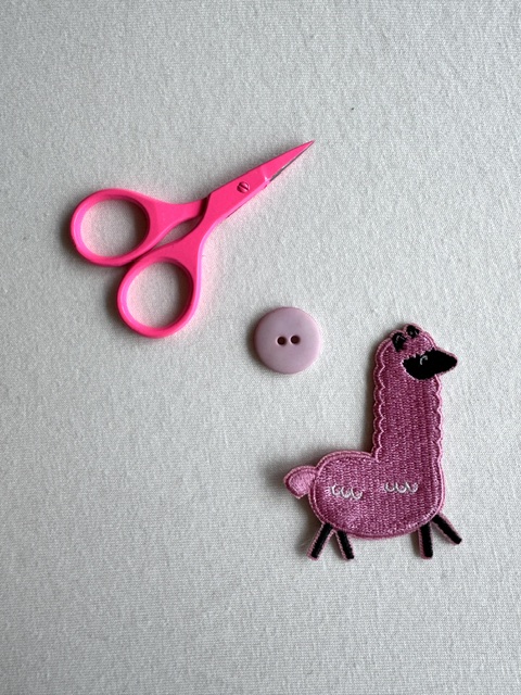 Beige-pink matte plastic button