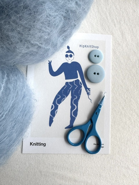 Light blue matte plastic button