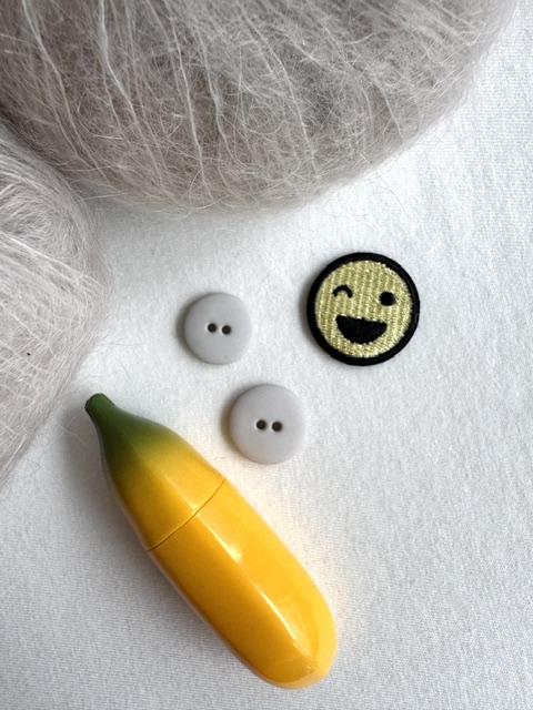 Light grey matte plastic button