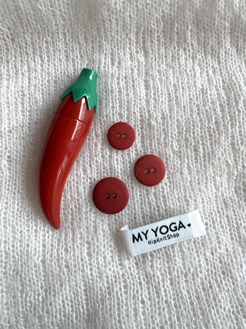 Dark red matte plastic button
