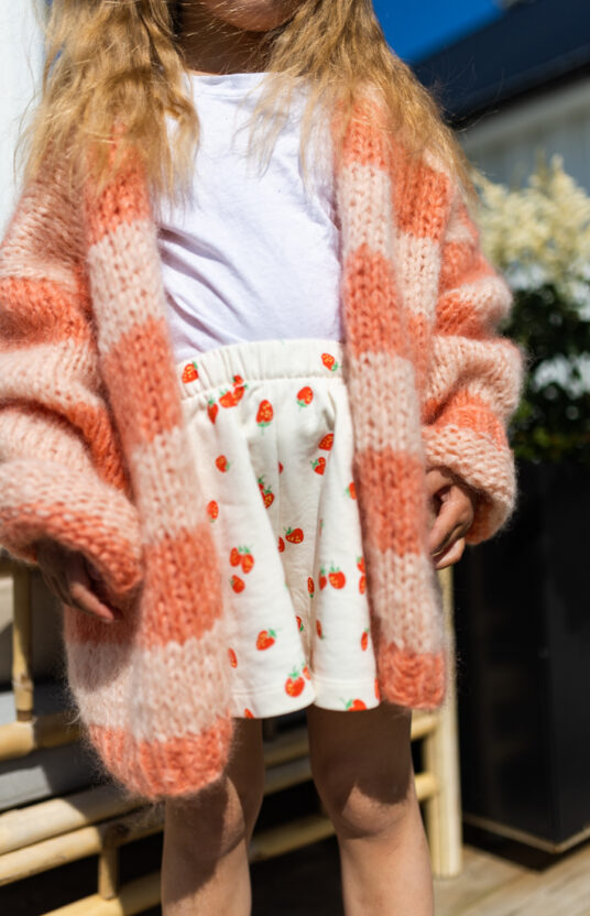 Knitted cardigan for girl pattern. Knitting pattern cozy cardigan knitted for children with stripes. Inspiration knit girl