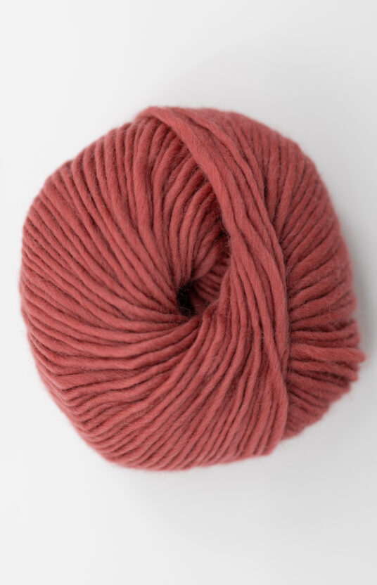yarn in a muted red shade. Pure wool yarn online store yarn and knitting inspiration knitting project