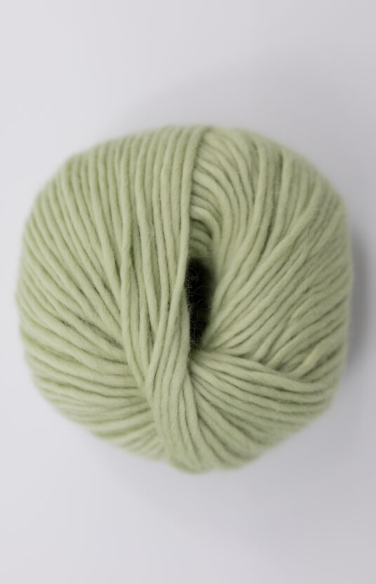 Pistachio green yarn knitting project thick needles. Wool yarn that doesn't itch. Hip Wool online store.