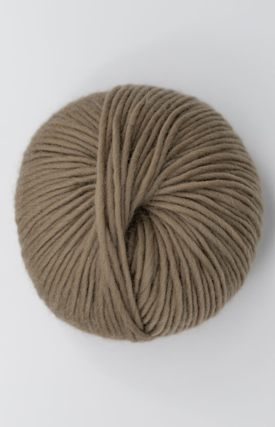 Wool yarn knitting on thick needles brown
